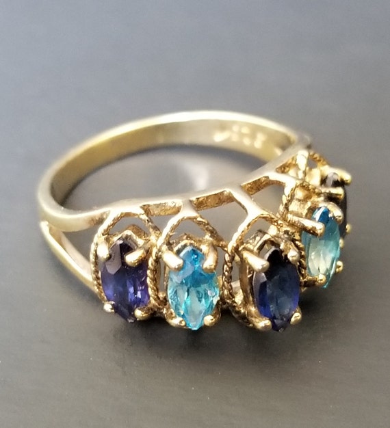 Sterling Silver Ring With Sapphire Colored Stones