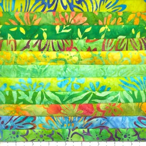 May include: A stack of colorful batik fabric in various shades of green, yellow, and blue. The fabric features floral and abstract patterns. The image showcases a variety of designs, perfect for quilting or crafting projects.