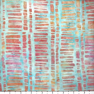 May include: A fabric with a watercolor-style design. The pattern features vertical rows of rectangular shapes in shades of coral and orange, set against a light blue background. The fabric has a soft, textured appearance, suitable for various craft projects.