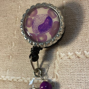 White blood cell retractable badge reel