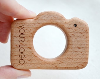 Wooden camera teether with your logo . Custom baby photography client gift . Wholesale camera toy