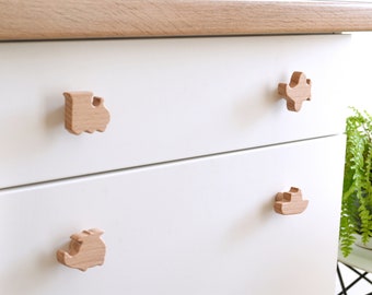 Dresser knobs boy . Toddler room transport theme drawer handles . Car tractor train helicopter airplane boat transportation knobs nursery