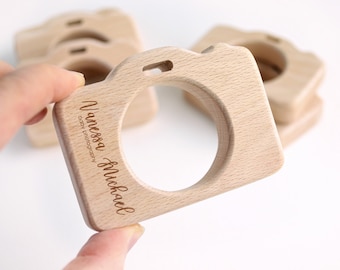 Wood camera newborn photographer client gift . Toy camera teether with logo .