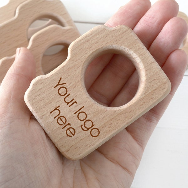 Bulk newborn photographer client gift . Personalized wood camera teether with logo wholesale