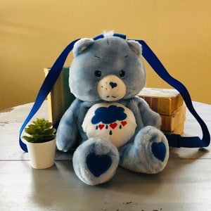 Grumpy bear backpack discount