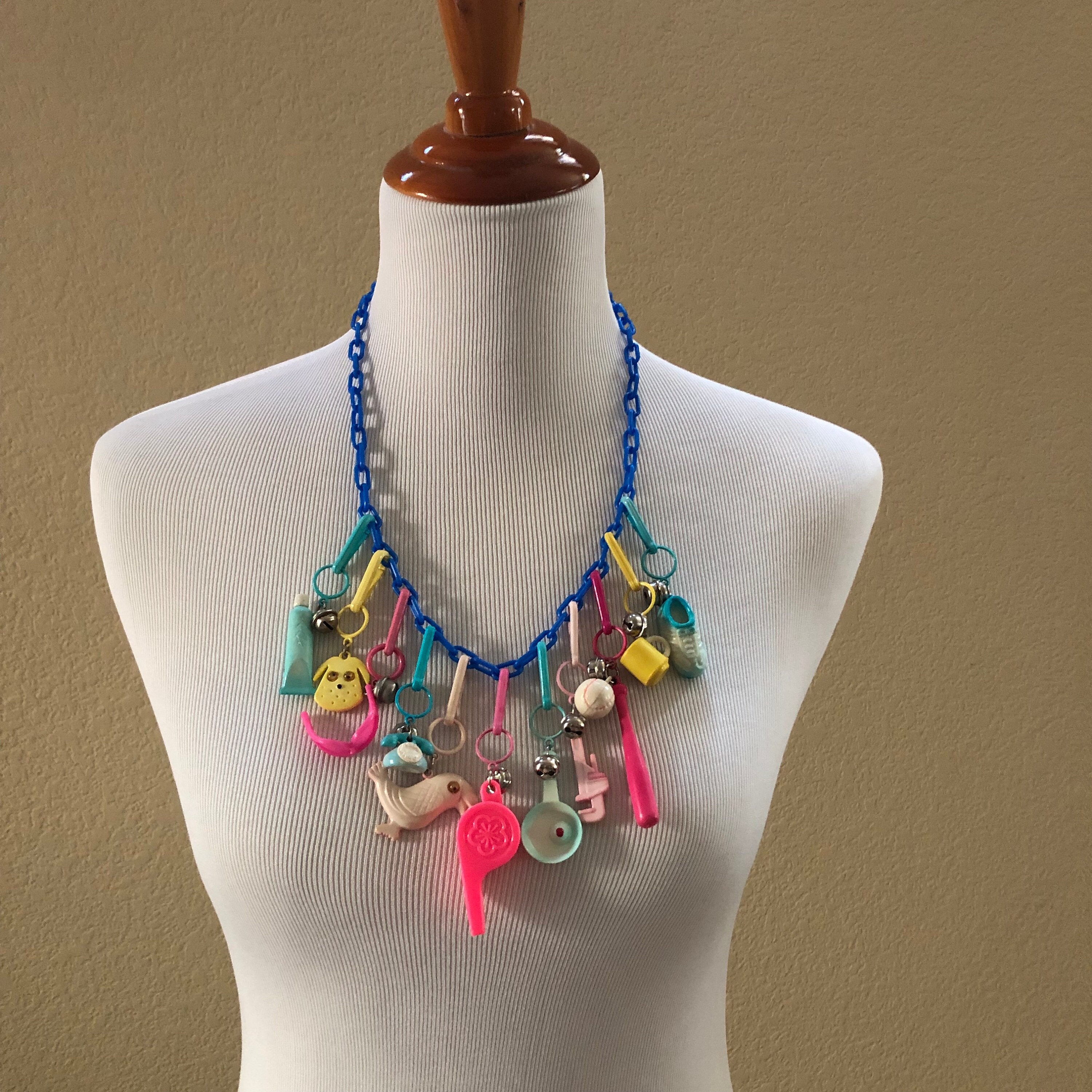 1980'S VINTAGE BELL CLIP PLASTIC CHARM NECKLACE WITH 30 RETRO 80'S CHARMS!!  #3 -- Antique Price Guide Details … | Vintage bell, Nostalgic toys,  Hallmark ornaments