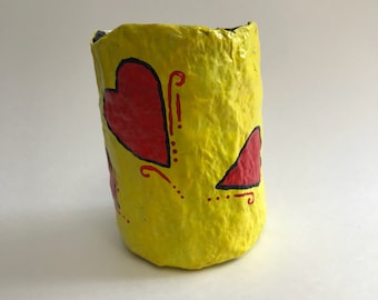 El Penholder de La Pluma del Corazón Amarillo