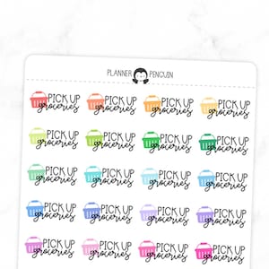 May include: A sticker sheet featuring colorful illustrations of grocery baskets with the text "PICK UP groceries" in a handwritten font. The stickers are in various colors, including red, orange, yellow, green, blue, purple, pink, brown, gray, and beige.