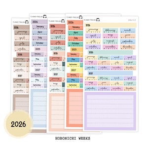 May include: A set of planner stickers featuring calendar months and the years 2025, 2026, and 2027. The stickers are in pastel shades of pink, blue, and yellow. The text "HOBONICHI WEEKS" is displayed at the bottom.