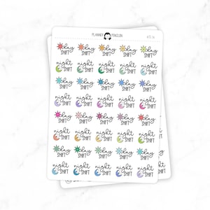 May include: A sheet of colourful stickers with illustrations of suns and moons. The stickers say "day shift" and "night shift" in a handwritten font.