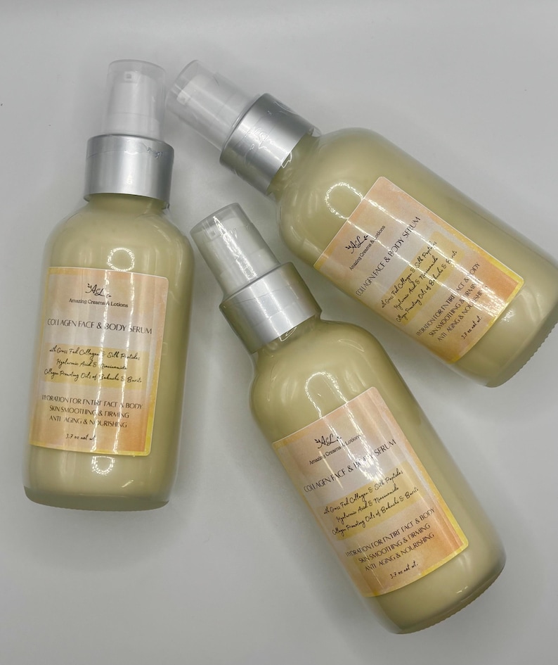 May include: Three bottles of Collagen Face & Body Serum with silver spray tops and cream-colored liquid. Each bottle has a label with text, including "Hydration for entire face & body" and "Anti-aging & nourishing."