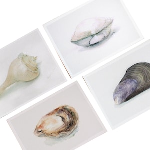 You choose from a selection of minimalist seashell watercolors on an off white ground.  Painted in neutral colors to go with most home decor.  All prints are on textured art paper to give them the look and feel of the original watercolor painting.