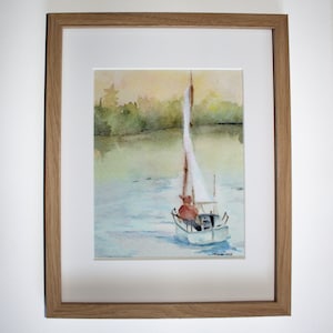 May include: A watercolor painting of a sailboat on a lake with a forest in the background. The sailboat has a white sail and a red figure in the boat. The water is a light blue and the sky is a light yellow.