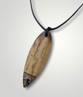 Handmade surfboard shape necklace with a message 