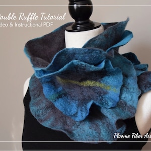 May include: A blue and gray felted wool scarf with a ruffled design. The scarf is displayed on a white mannequin. The text "Double Ruffle Tutorial Video & Instructional PDF" and "Ploom Fiber Arts" are visible in the image.