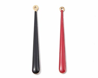 2 black or red enameled rod pendants