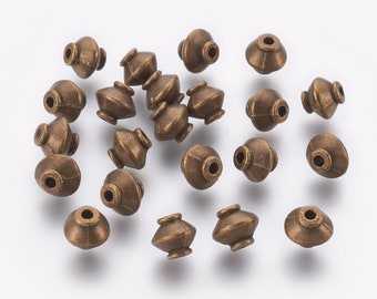 10 perles 7mm toupies style tibetain bronze