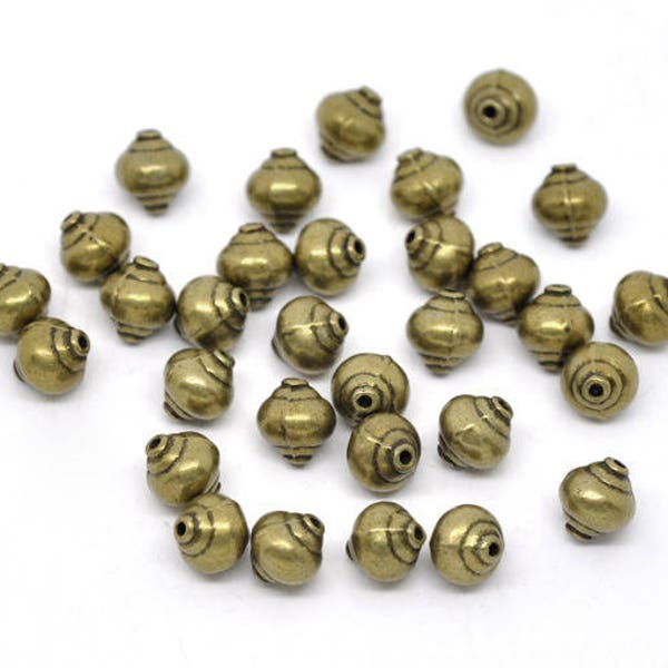 10 perles 8mm intercalaires toupies bronze 8mm