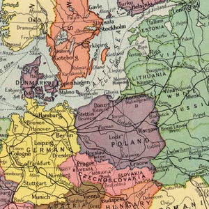 May include: A detailed vintage map of Northern and Central Europe, featuring countries like Germany, Poland, and Scandinavia. The map uses a classic color scheme to highlight geographical regions and cities, with text labels.