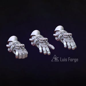 May include: Three light gray robotic gauntlets featuring articulated fingers, a rounded shoulder joint, and a dual-barrel weapon mounted on the back of the hand. The text Luis Forge is visible in the lower right corner of the image.