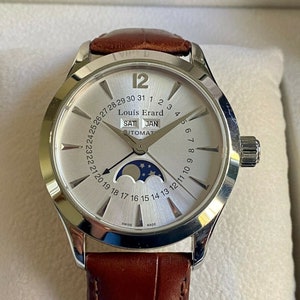 Sold at Auction: GENTLEMANS LOUIS ERARD MOONPHASE WATCH 43203,round,silver  dial with gold da