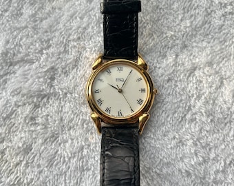 Reloj vintage ESQ de Movado, de los años 90, de cuarzo, chapado en oro, con asas elegantes, fabricado en Suiza.