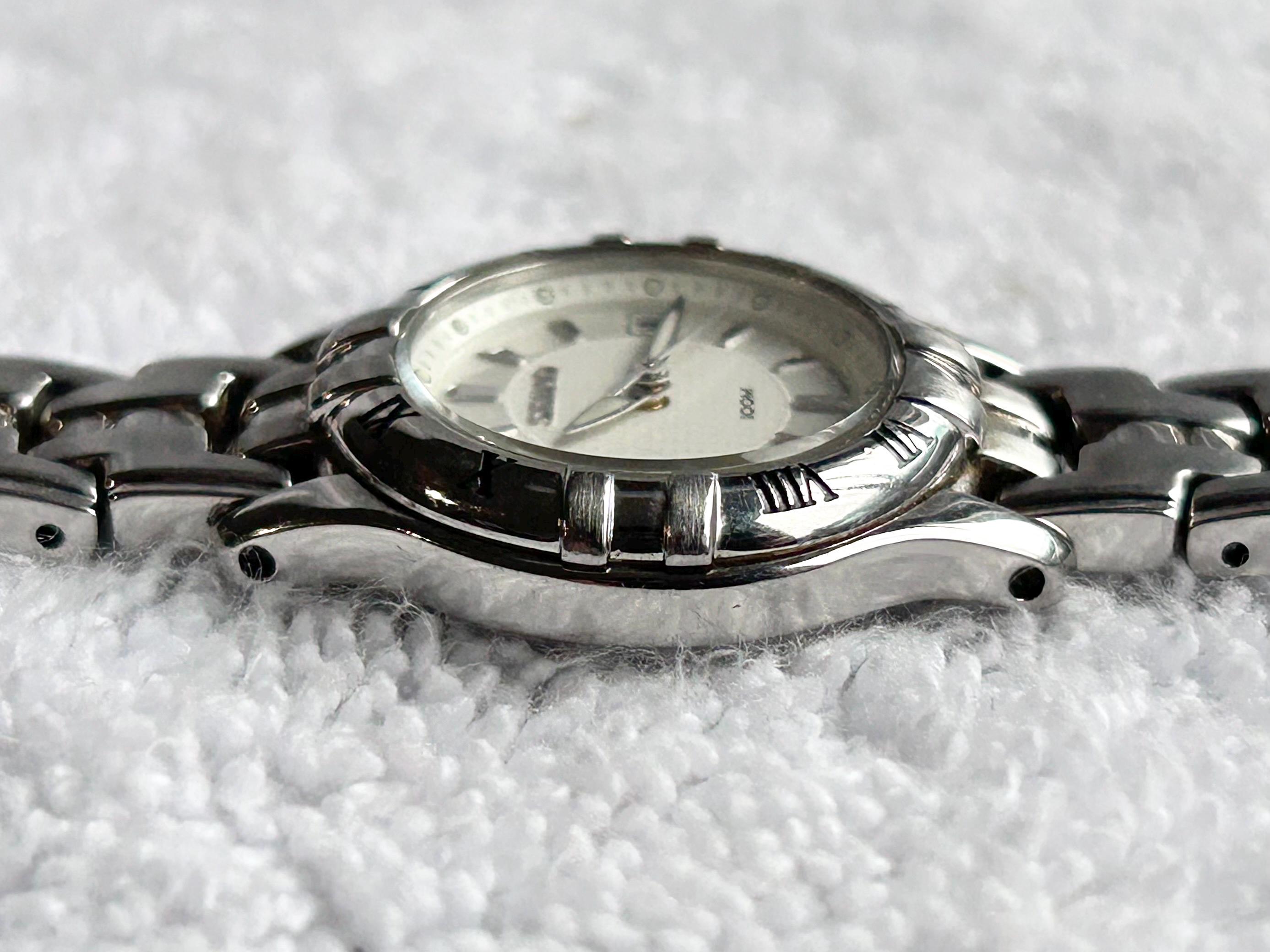 Seiko lady battery water resistant 100m stainless steel w/date Amazon.com: Seiko Women main image 2