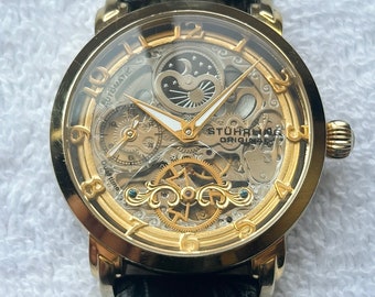 Modern Stuhrling Original Skeleton Automatic 22 Jewels Dual-Time Luminescent Watch