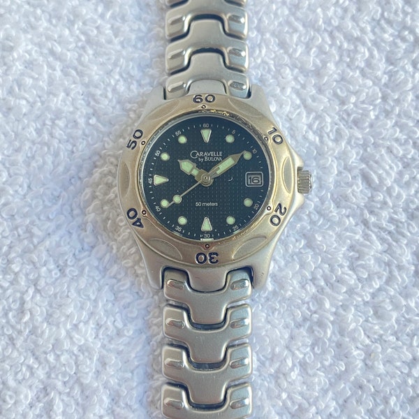 Vintage Bulova Caravelle Diver's Rotating Bezel Stainless Steel Date Ladies Cocktail Watch