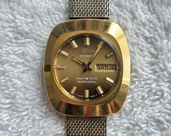 Vintage Mido Multistar Datoday Day/Date Gold Plated Automatic 17 Jewels Swiss Made Watch