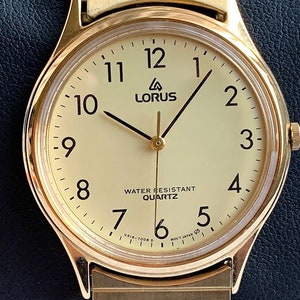  Lorus Reloj clásico de acero inoxidable para hombre con correa  de metal, Azul, Classic : Ropa, Zapatos y Joyería