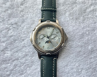 Vintage Guess Waterpro drievoudige registers dag-/nacht-, weekdag- en datumregisters lichtgevend quartzhorloge