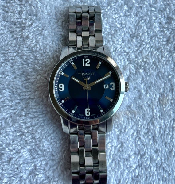 Tissot PRC 200 / orologio uomo / quadrante bianco / cassa e bracciale acciaio
