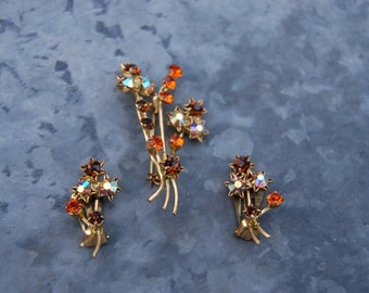 Signed Austria Vintage Orange, Brown and AB Tan Rhinestone Earrings and a Star Burst Brooch Set 111