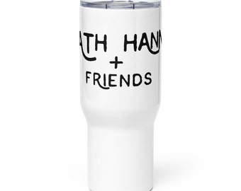 May include: White stainless steel travel tumbler with a black graphic that says "Seth Hann + Friends".