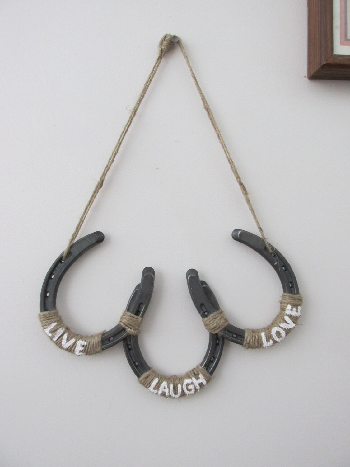 Horseshoe wall decor/hanging featuring 3 horseshoes with the Etsy