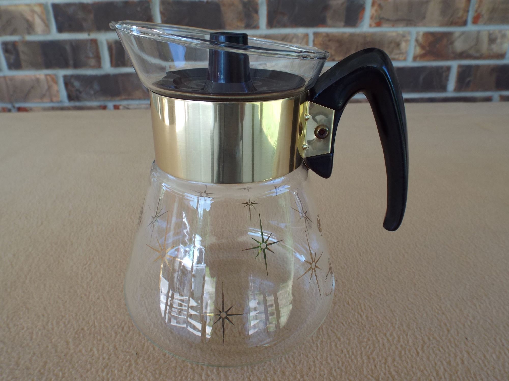 Vintage Corning Silver Carafe Tea Pot or Juice Pitcher With Ice Holder 