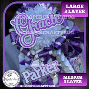 May include: A decorative homecoming mum featuring purple and silver glitter ribbons, a white chrysanthemum, and two layered cutouts with the names Gracie and Parker. Text boxes indicate Large 3 Layer and Medium 3 Layer options.