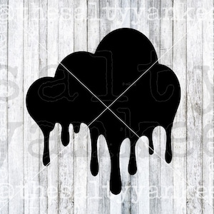 May include: Black cloud shape with dripping edges, resembling melted wax or paint. The cloud is isolated against a white woodgrain background.
