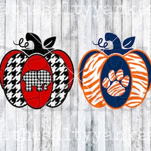 May include: Two pumpkin-shaped designs, one with a red, white and black houndstooth pattern and a white elephant silhouette, and the other with an orange and white zebra pattern and a blue paw print with an orange and white zebra pattern.