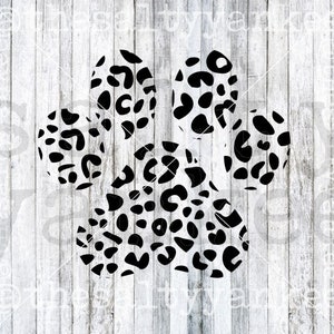 May include: Black and white leopard print flower design. The flower has five petals.
