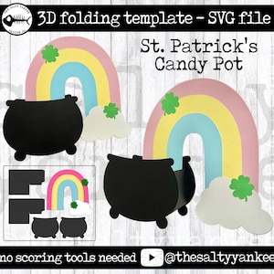 May include: A 3D folding template for a St. Patrick's Day candy pot. The template features a rainbow with clouds and shamrocks, and a black pot with a lid. The text "St. Patrick's Candy Pot" and "no scoring tools needed" are also included.