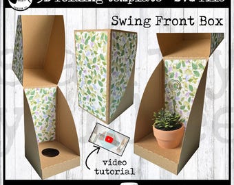 May include: A 3D folding template SVG file for a Swing Front Box. The box is made of brown cardboard with a floral patterned interior. The image includes a video tutorial link and text that says "no scoring tools needed".