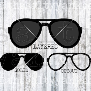 May include: Three black sunglasses, one with a layered design, one solid, and one cutout. The sunglasses are labeled "LAYERED", "SOLID", and "CUTOUT".