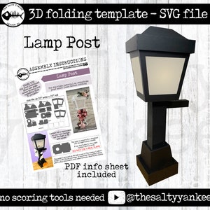 Puede incluir: Una plantilla de plegado 3D en blanco y negro para una farola. La plantilla es un archivo SVG digital e incluye una hoja de información PDF. La imagen también muestra una maqueta 3D de la farola, que es negra con una luz blanca en el interior.