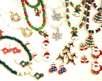 May include: A collection of Christmas-themed beaded necklaces with various charms, including snowflakes, reindeer, Santa Claus, Christmas trees, and stockings. The necklaces are made with red, green, and white beads.