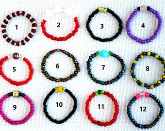Beaded Rings With Stretchy Beading Cord and Some Made With Wire