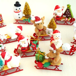 Christmas Miniature Red Sled Scenes With Christmas Decorations