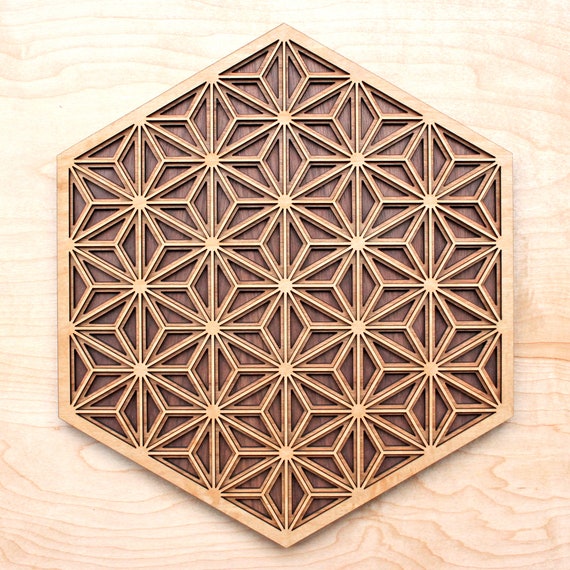 Hexagon Shaped Wood Wall Art Sculpture Featuring a Variety of 