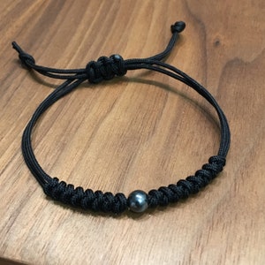 6mm Hematite Bead w/ Good Luck Knots on Black Cord Bracelet